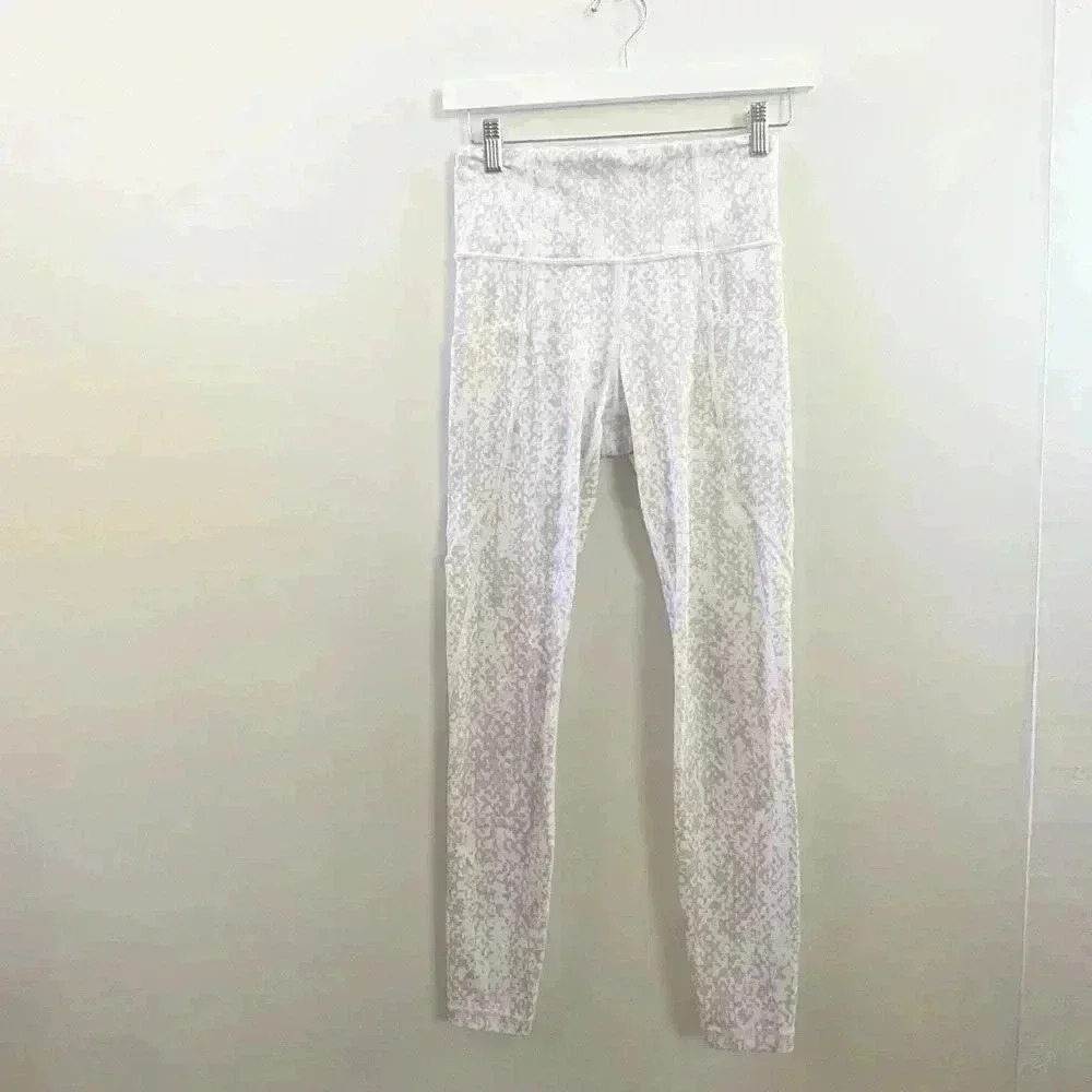 Athleta salutation stash snakeskin print leggings